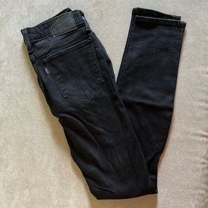 Levi’s 711 skinny distressed black jeans